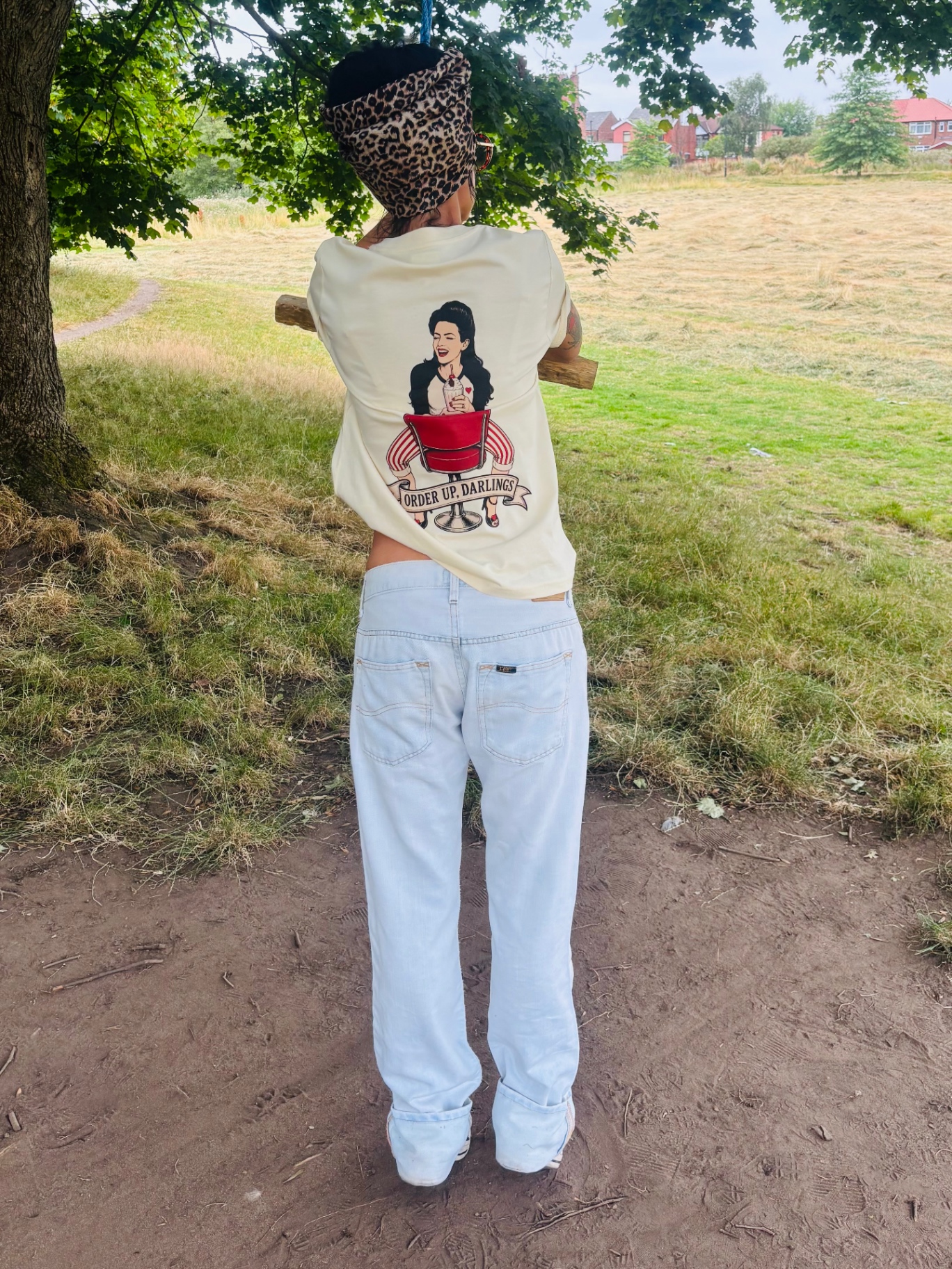 Order Up Darlings tee back print side angle with leopard scarf