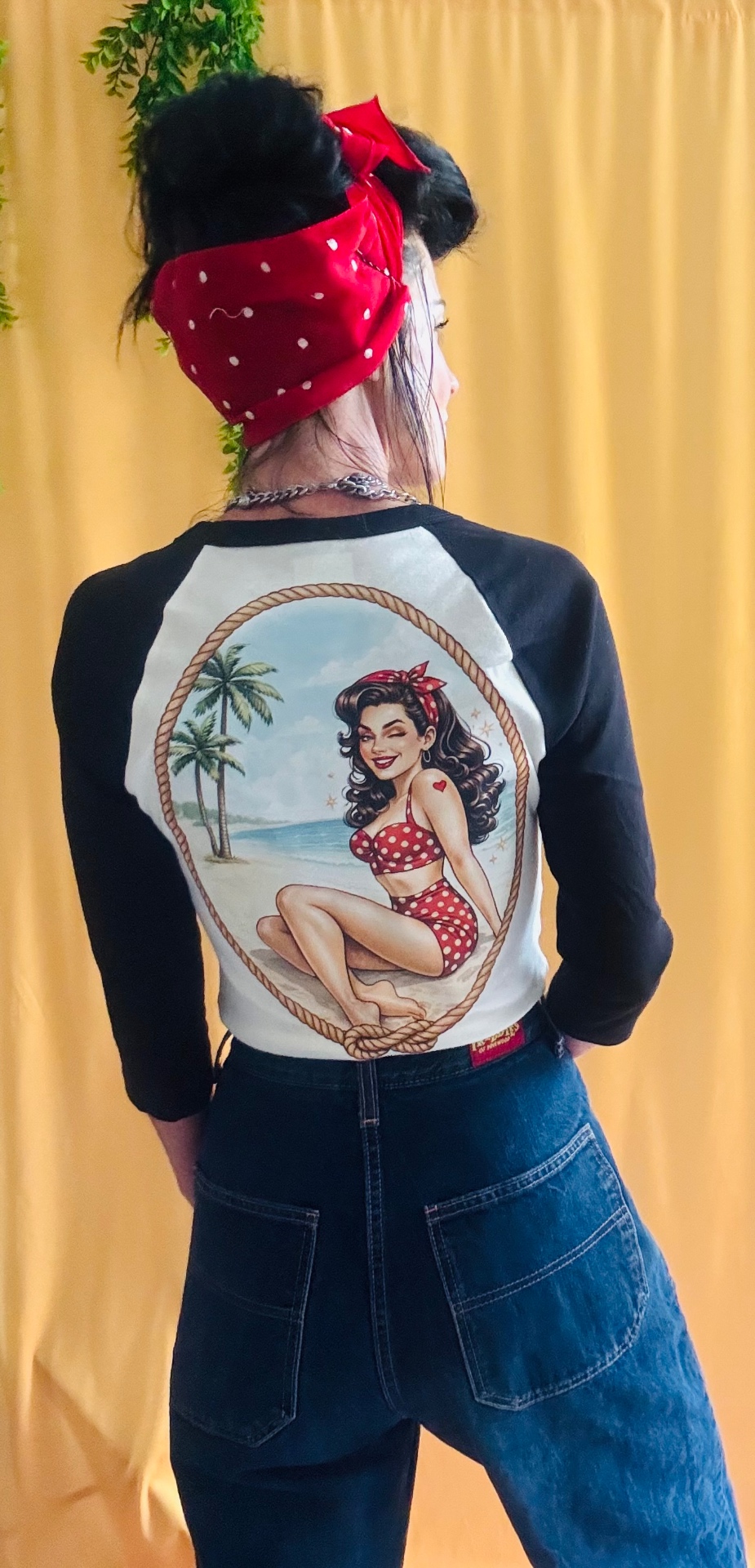 Beach Babe raglan tee back with sunshine pin-up artwork on yellow backdrop